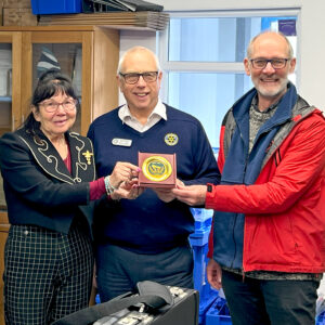 Roger, David and Cheryle with the the Token of love plaque