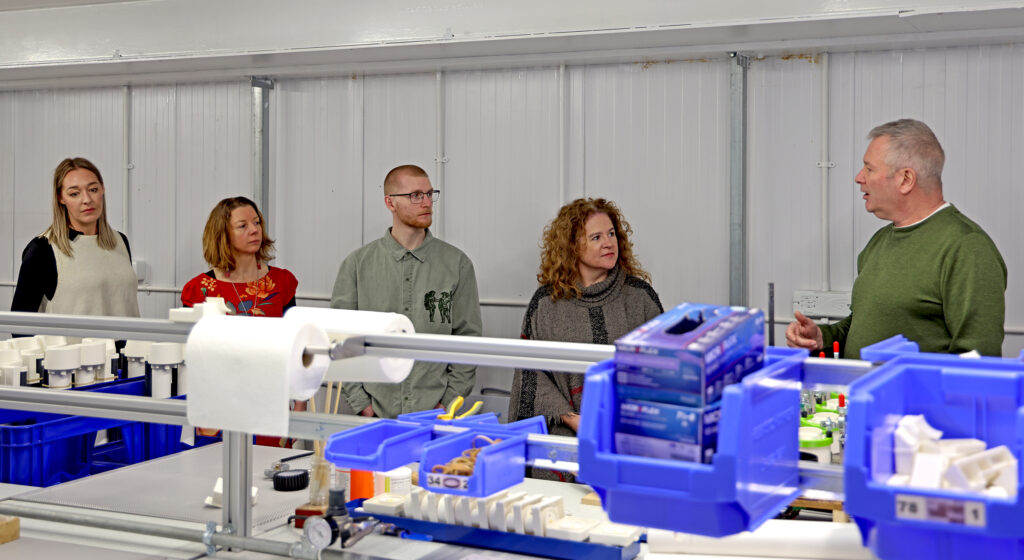 Peak Translations team at Aquabox in the filter assembly room 1
