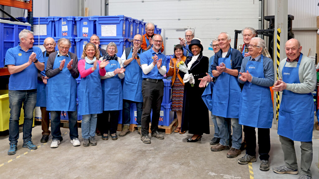 Theresa Peltier, High Sheriff of Derbyshire with the some of the Aquabox volunteers